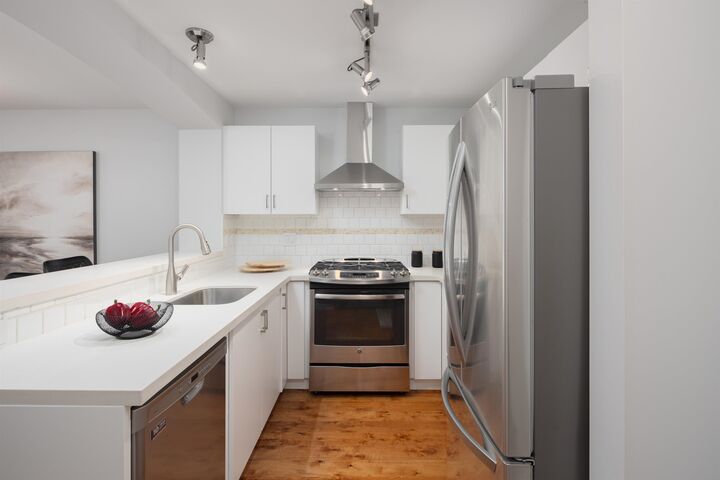 Property Photo: 2958 Silver Springs Boulevard 301 BC V3E 2R9
