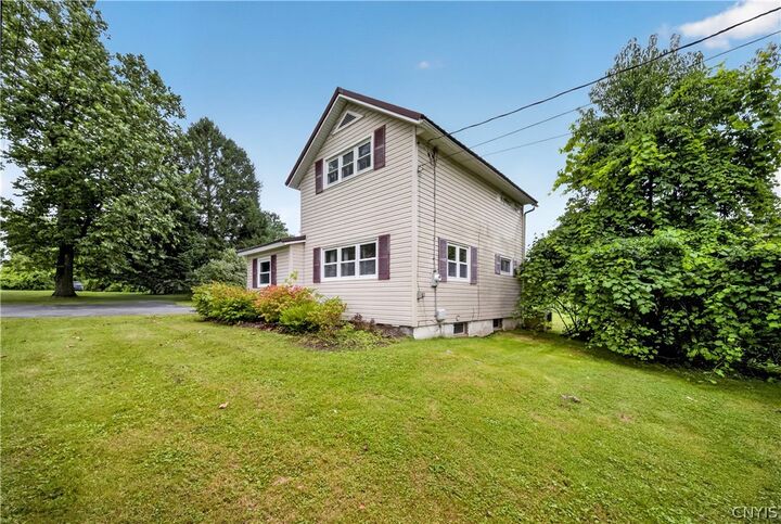 Property Photo: 1697 State Route 104A NY 13156