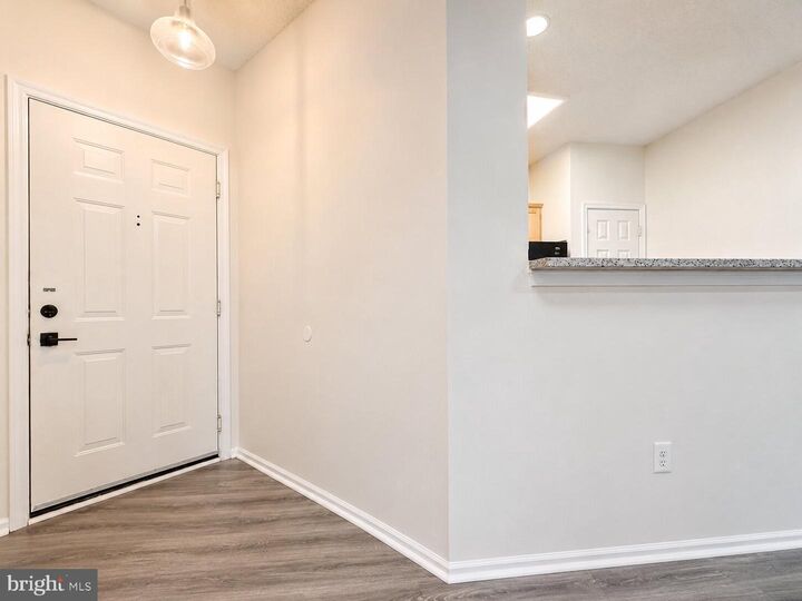Property Photo:  14314 Climbing Rose Way 102  VA 20121 