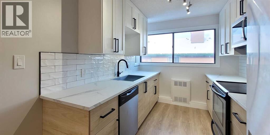 Property Photo:  2400 15 Street Southwest  AB T2T 5S3 