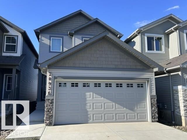 Property Photo: 20936 16 Av NW AB T6M 3J4