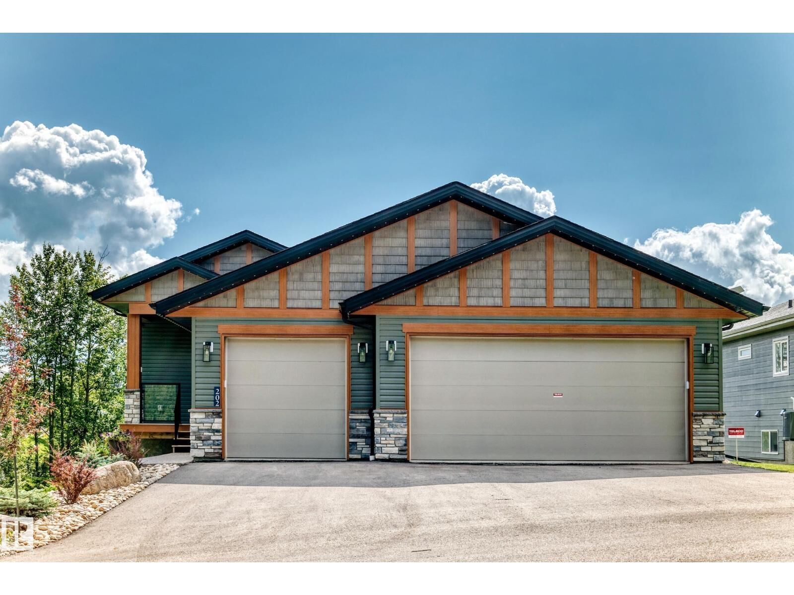 Property Photo:  202 55101 Ste Anne Trail  AB T0E 1A1 