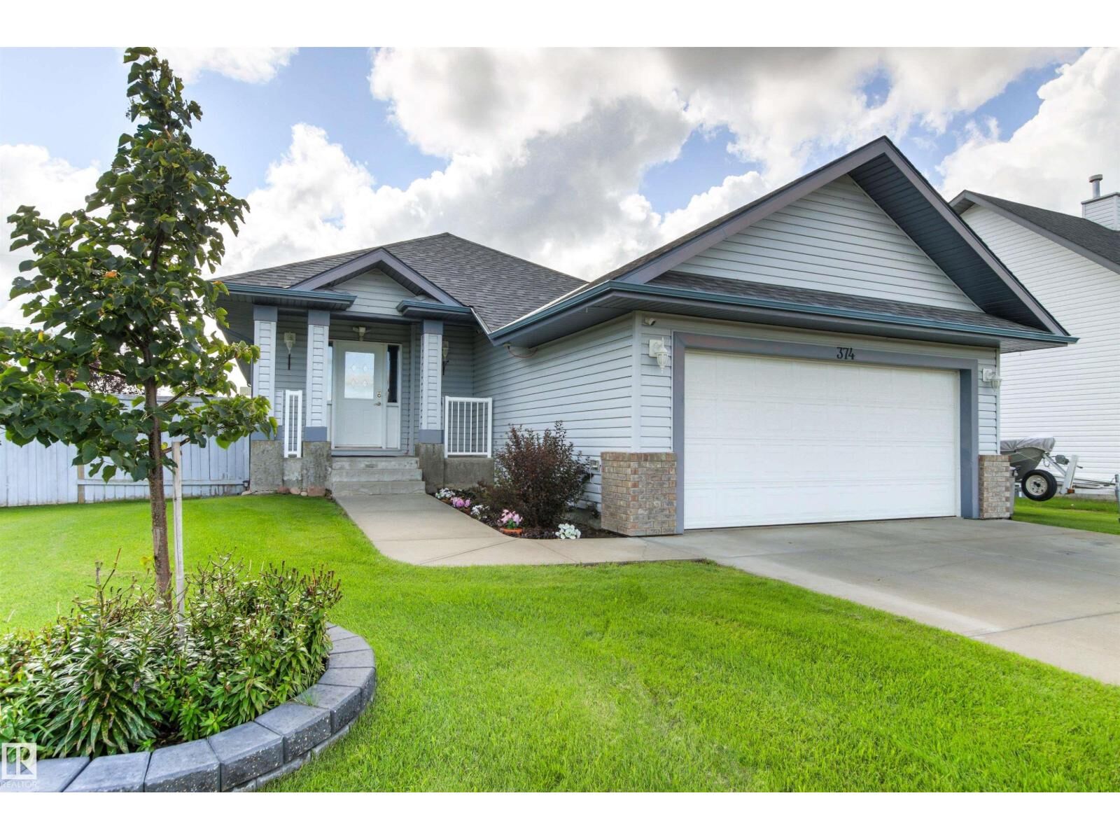 Property Photo:  374 Paquin St  AB T8R 2G5 