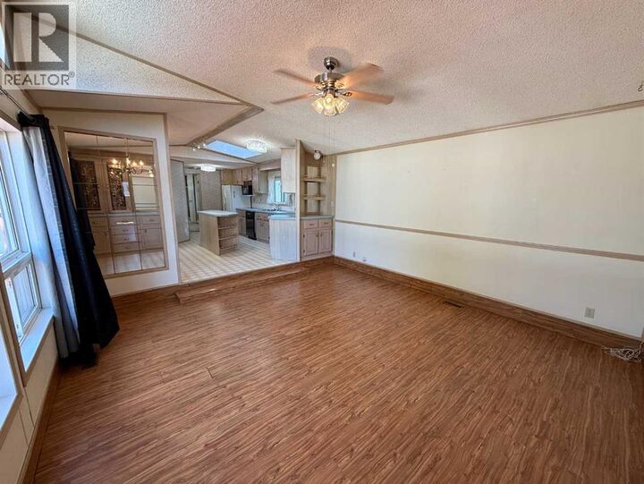 Property Photo:  700 Carmichael Lane  AB T7V 1S9 