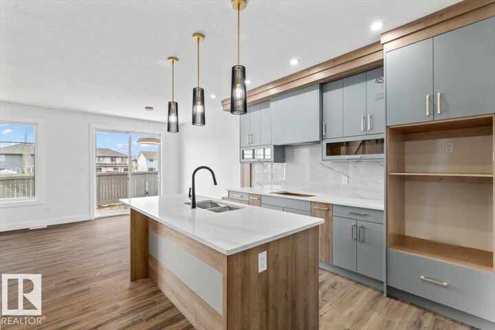 Property Photo:  69 Elliott Wynd  AB T8L 1R8 