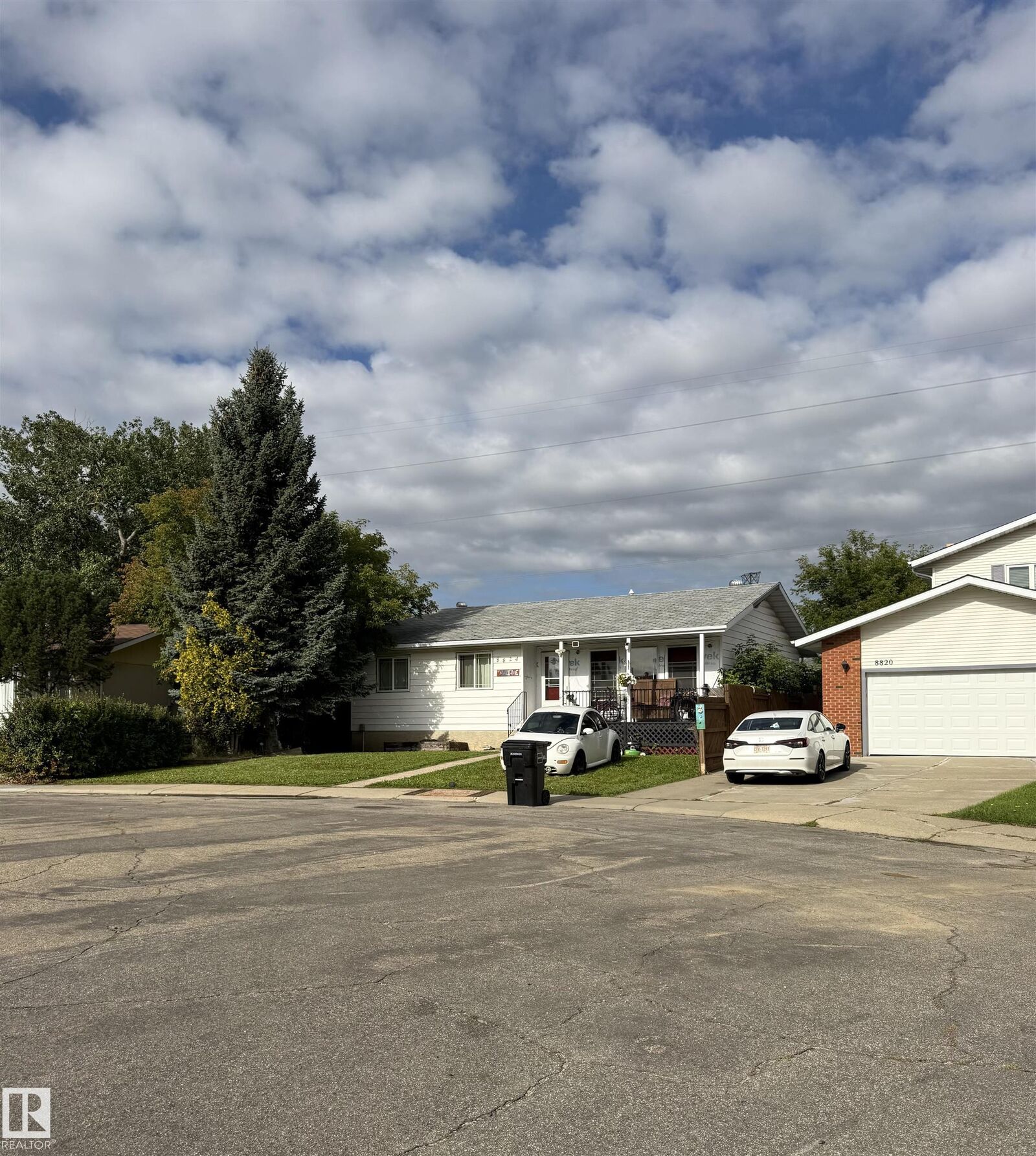 Property Photo:  8824 30 Avenue NW  AB T6K 2X7 