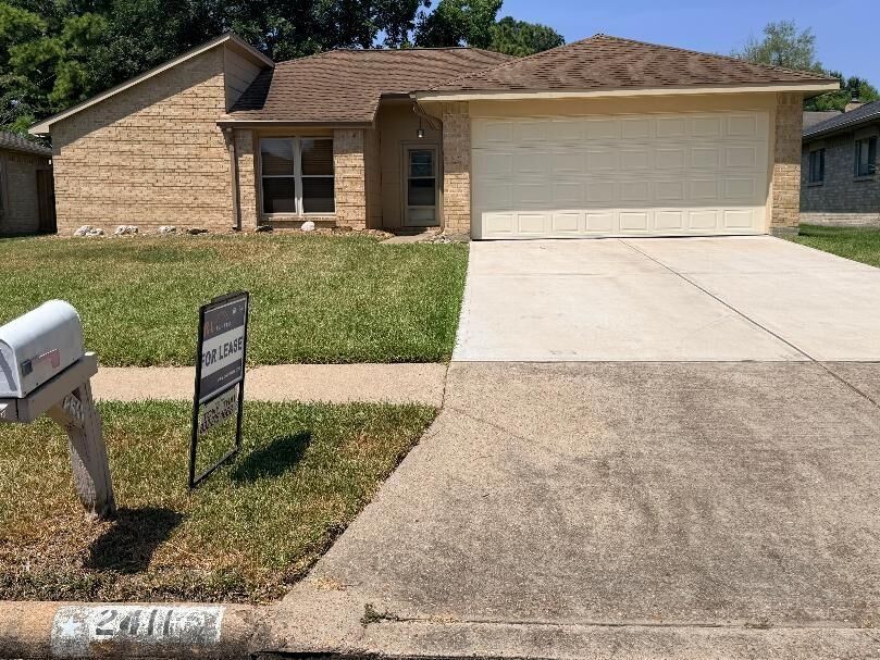 Property Photo: 2411 Woodwind Rd TX 77406