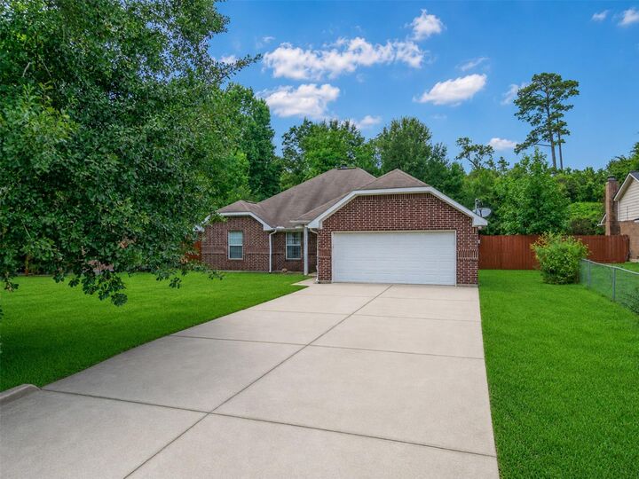 Property Photo:  1600 Sweetgum Street  TX 77385 