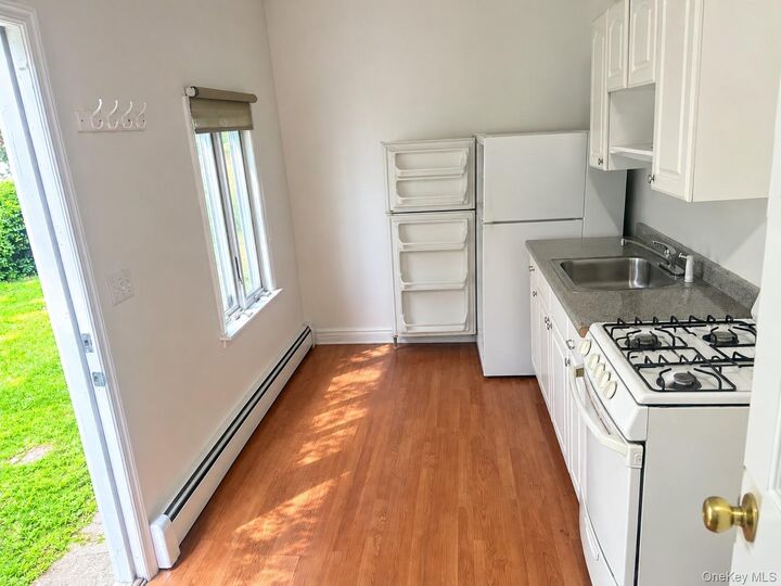 Property Photo:  48 Rosemont Avenue  NY 11738 