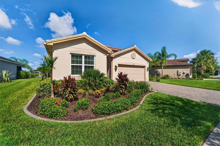 Property Photo: 15412 Santa Pola Drive FL 33598