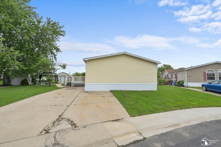 Property Photo: 584 Pine Tree Court MI 48162