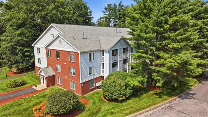 Property Photo:  1 Timberwood Dr 206  NH 03045 