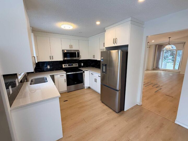 Property Photo: 651 Macewan Drive NW AB T3K 3R1