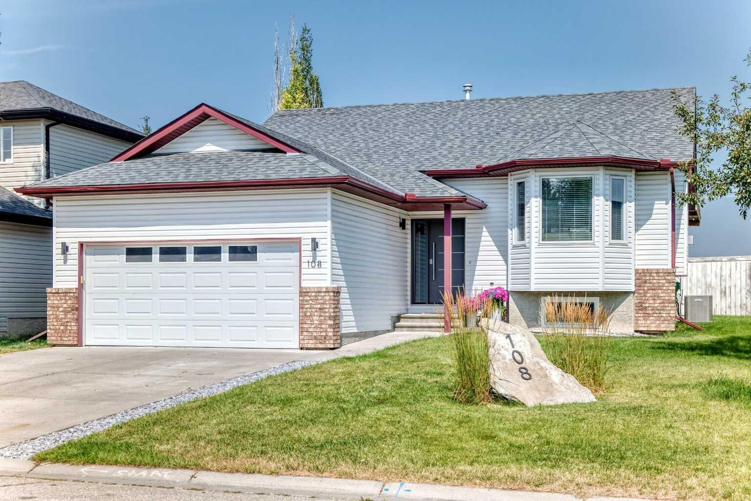 Property Photo: 108 High Ridge Place NW AB T1V 1X8