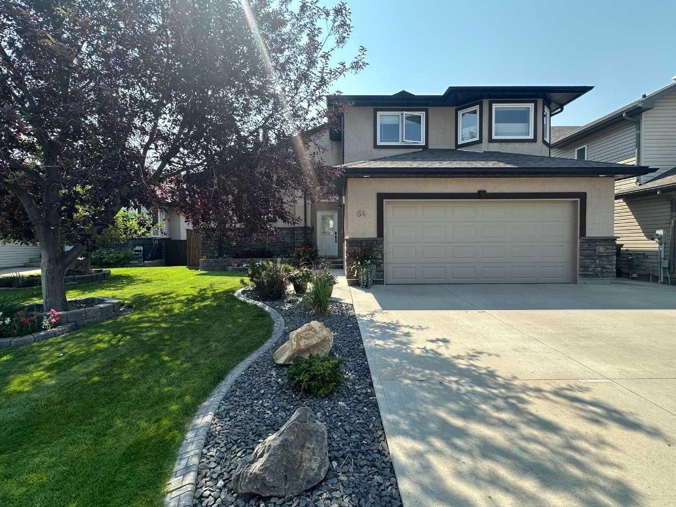 Property Photo:  64 Riverwood Manor W  AB T1K 7Y2 