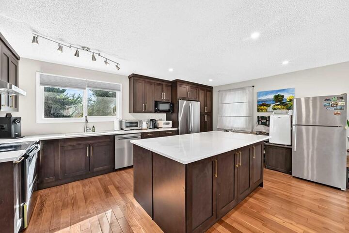 Property Photo: 179 Deer Ridge Way SE AB T2J 5Y8