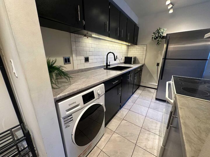 Property Photo:  1829 11 Avenue SW 206  AB T3C 0N2 