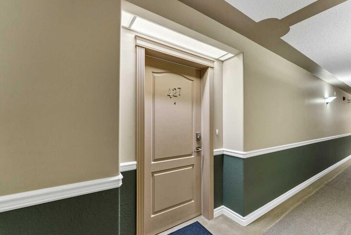 Property Photo: 201 River Ridge Drive NW 427 AB T1A 8V5