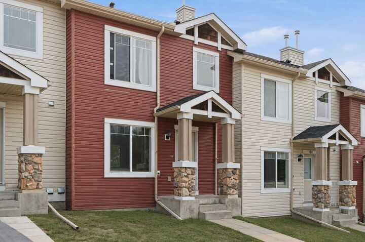 Property Photo: 106 Panamount Drive NW AB T3K 6K3