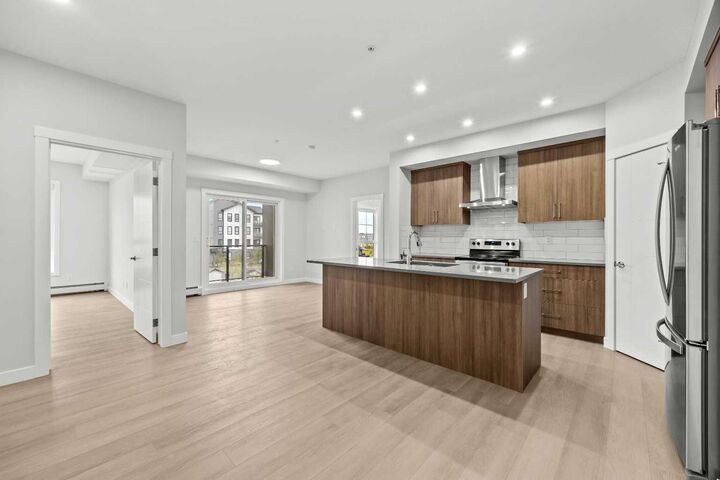 Property Photo: 100 Banister Drive 3301 AB T1S 5Y4