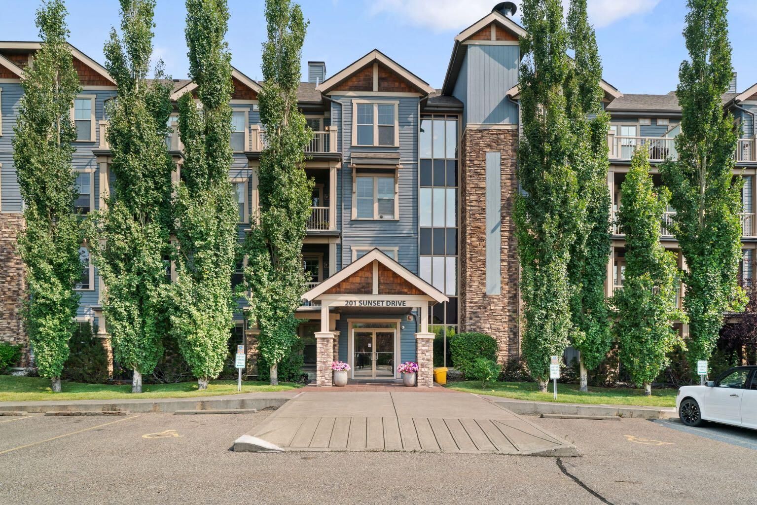 Property Photo: 201 Sunset Drive 407 AB T4C 0H5