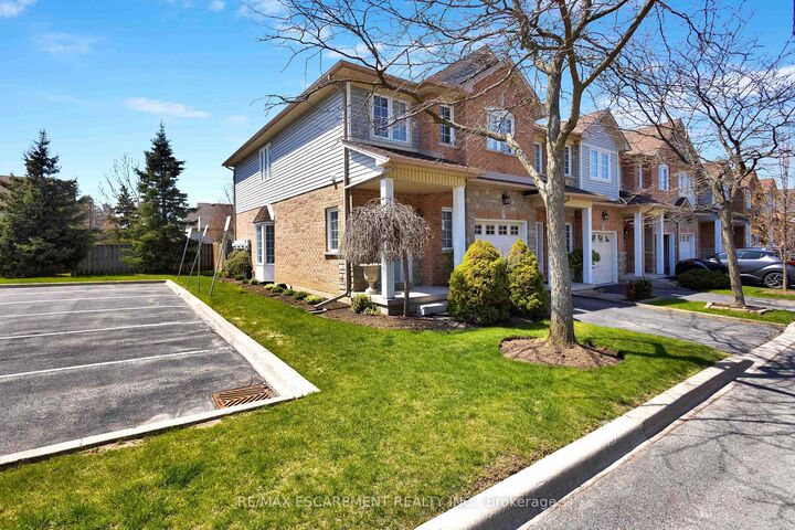Property Photo: 232 Stonehenge Drive 8 ON L9K 1R5