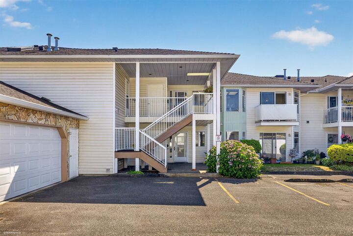 Property Photo: 7156 121 Street Street 234 BC V3W 0J6