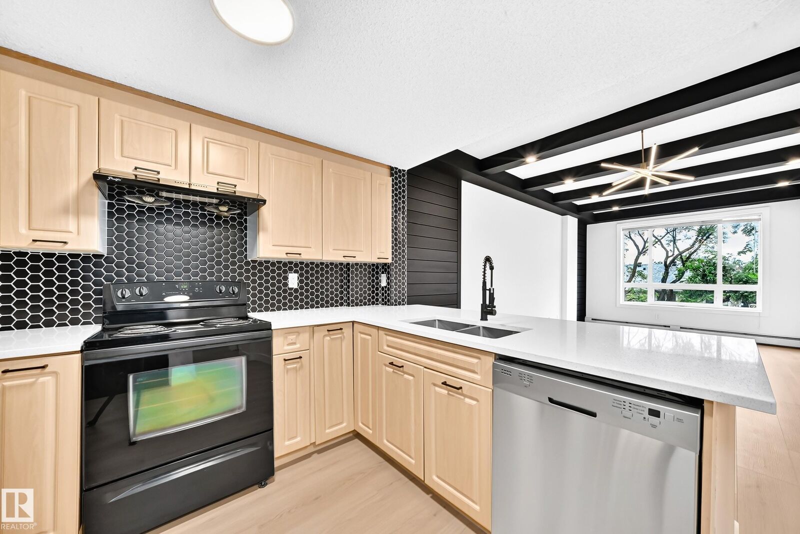 Property Photo:  6315 135 Avenue NW 323  AB T5A 5J7 