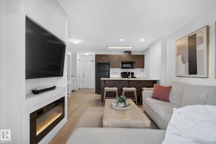 Property Photo:  5521 7 Avenue SW 203  AB T6X 2A8 