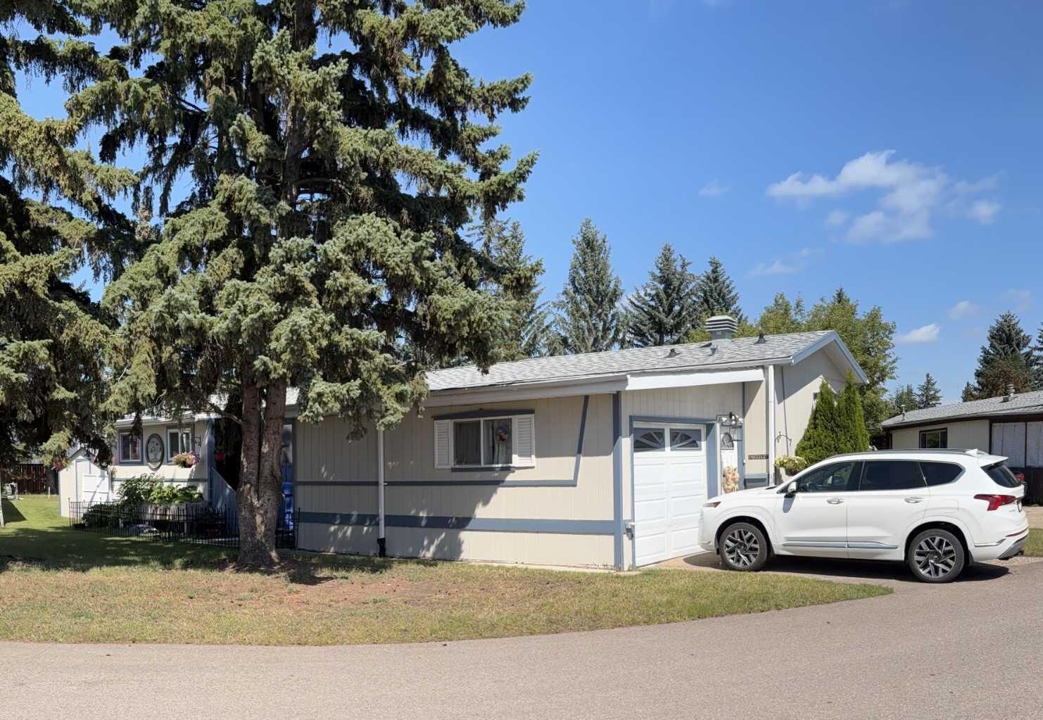 Property Photo: 63 Parkside Drive AB T4P 1K1