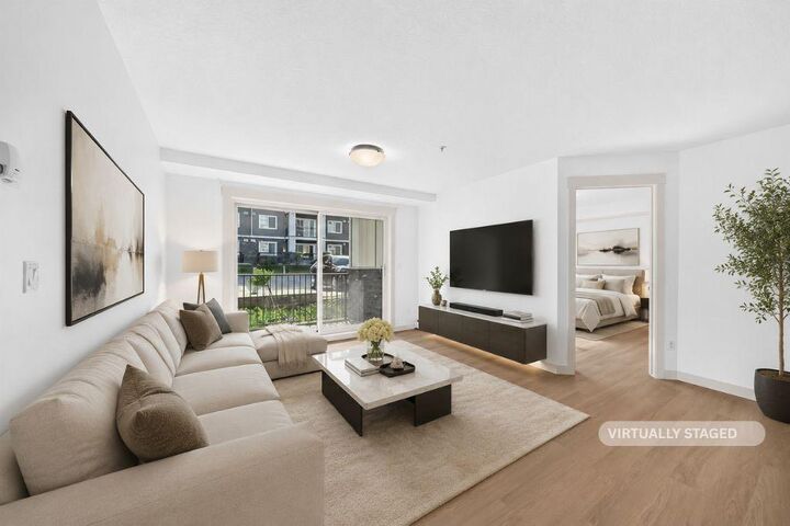 Property Photo:  450 Sage Valley Drive NW 2105  AB T3E 0V6 