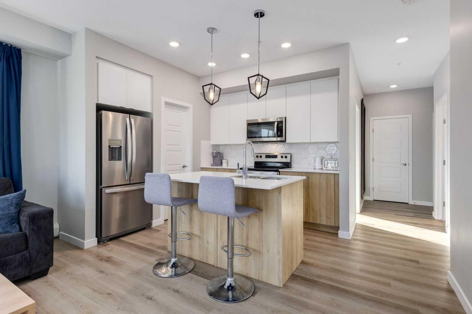Property Photo:  1605 17 St Street SE 201  AB T2G 2L7 