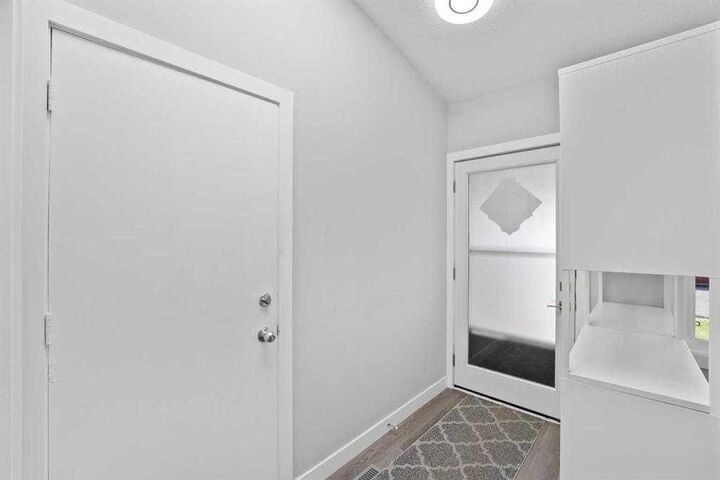 Property Photo:  12 Cedargrove Road SW  AB T2W 4T9 