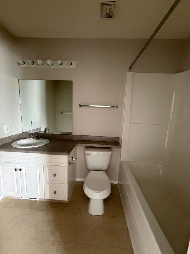 Property Photo: 104 Loutit Road 304 AB T9K 0A2