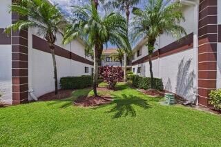 Property Photo:  15451 Pembridge Drive 203  FL 33484 