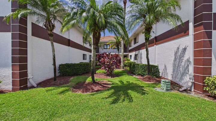 Property Photo:  15451 Pembridge Drive 203  FL 33484 