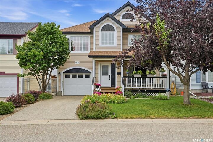 Property Photo: 1030 Orchid Way N SK S4X 4R4