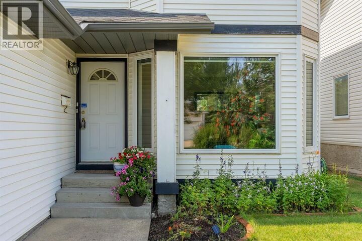 Property Photo: 11 Arbour Summit Close Northwest AB T3G 3W1