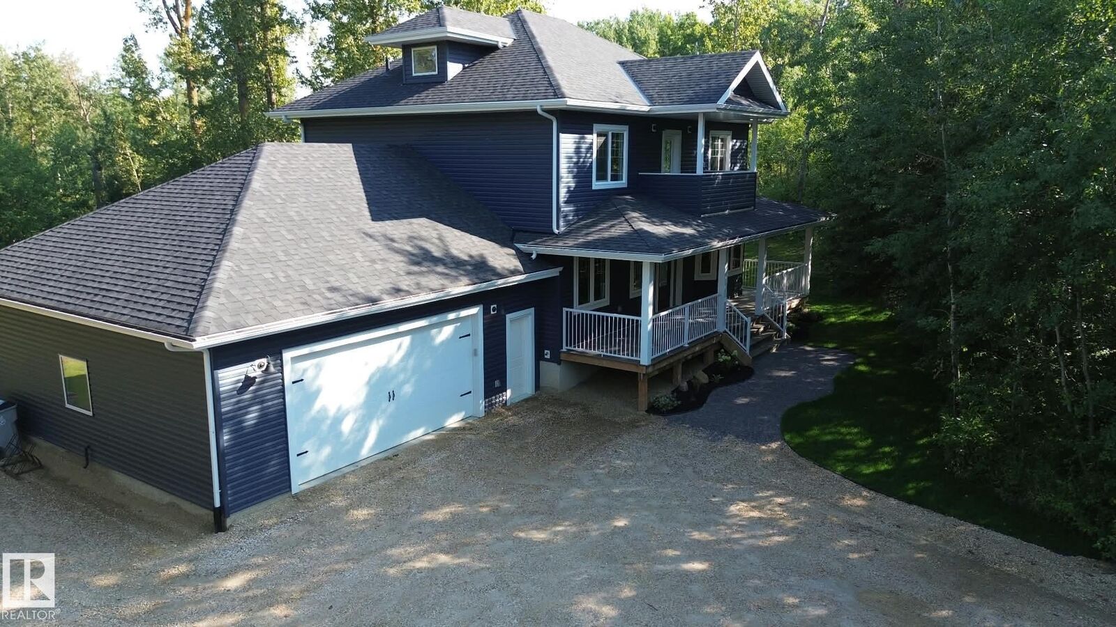 Property Photo: 267 Rge Road 20 AB T7Z 2V2