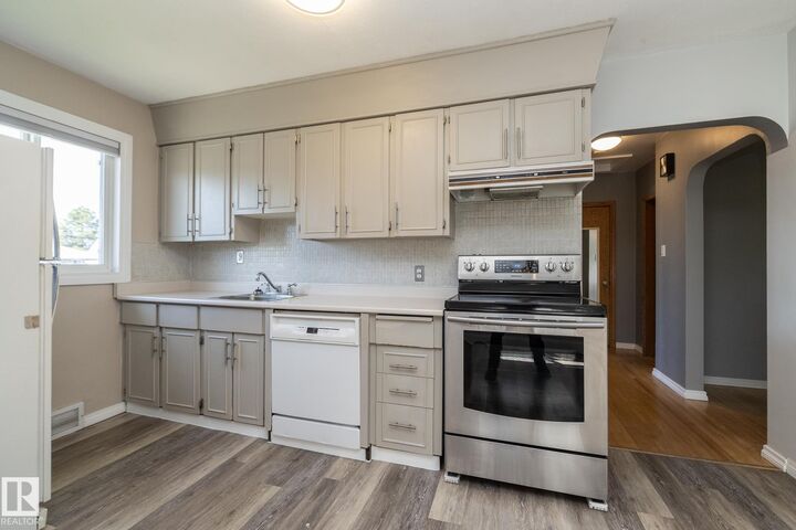 Property Photo:  12322 94 Street NW  AB T5G 1K3 