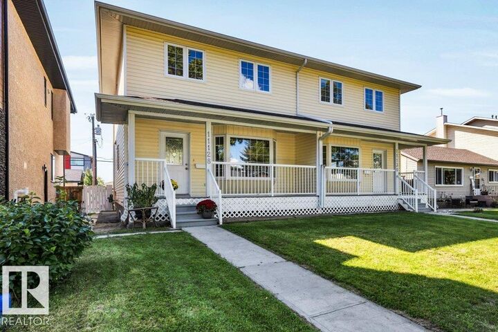 Property Photo:  11128 132 Street NW  AB T5M 1E5 