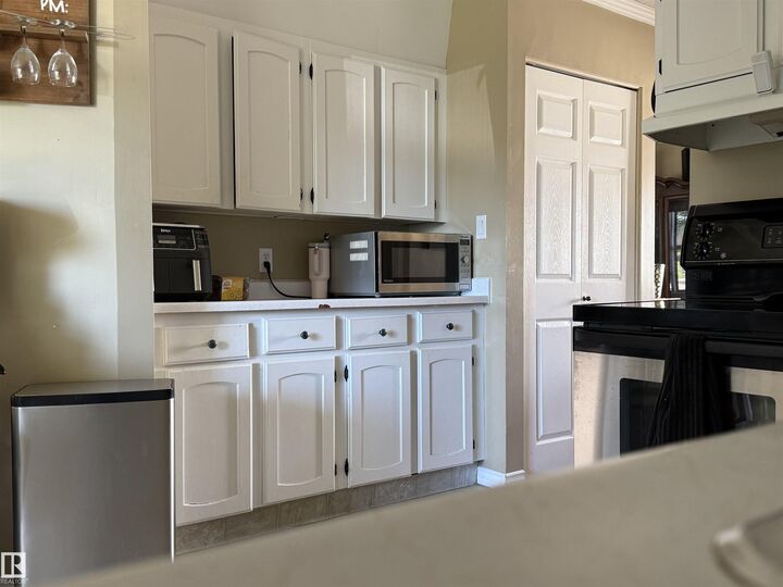 Property Photo: 153 Maple Crescent AB T9A 2E3