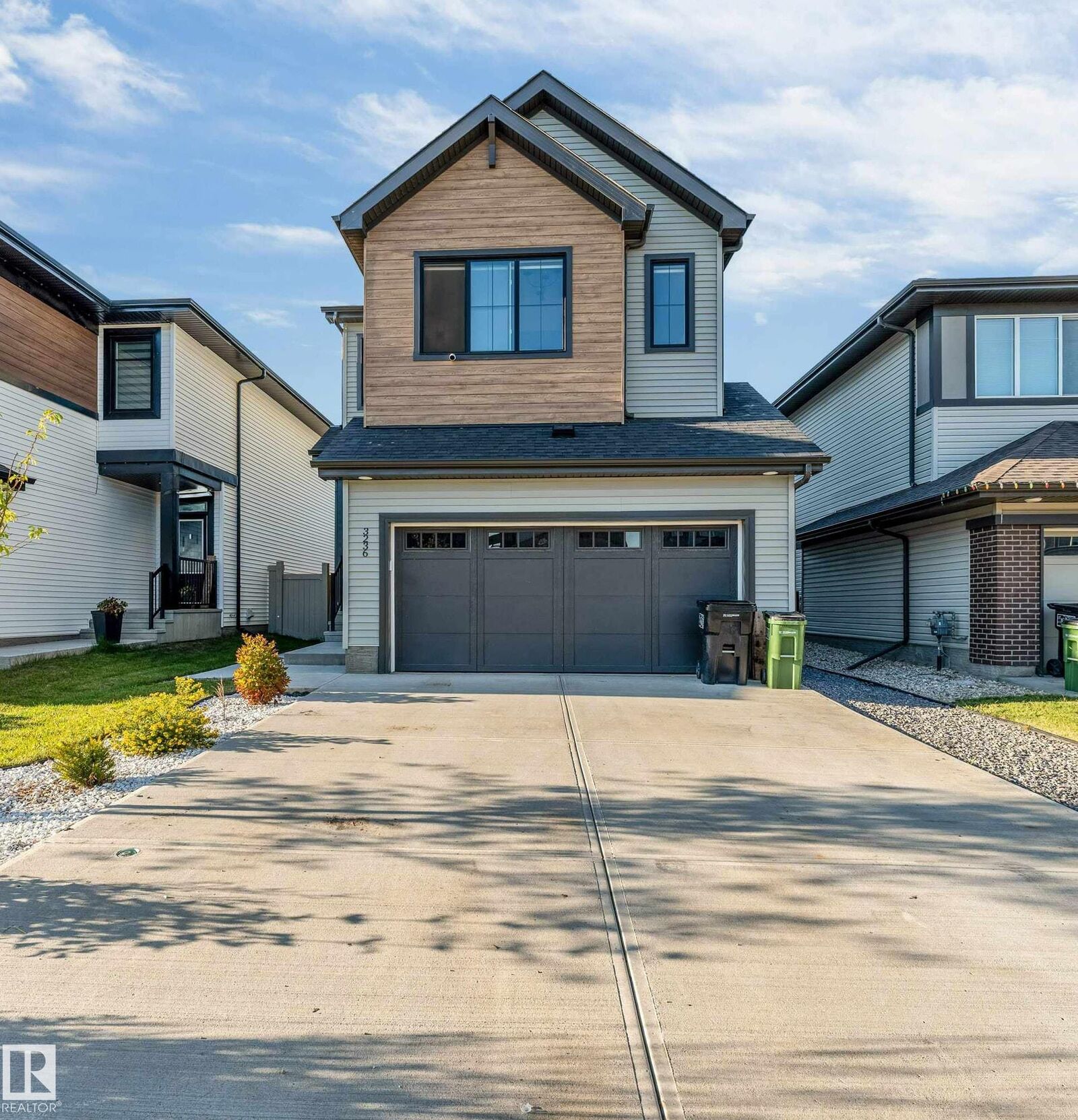Property Photo: 3236 Chernowski Way SW AB T6W 5H2
