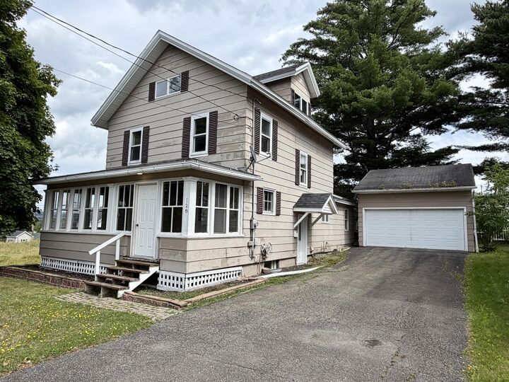 Property Photo:  128 Fraser Avenue  ME 04756 