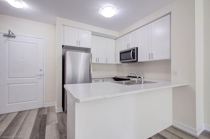 Property Photo: 450 Dundas Street E 110 ON L8B 0L7