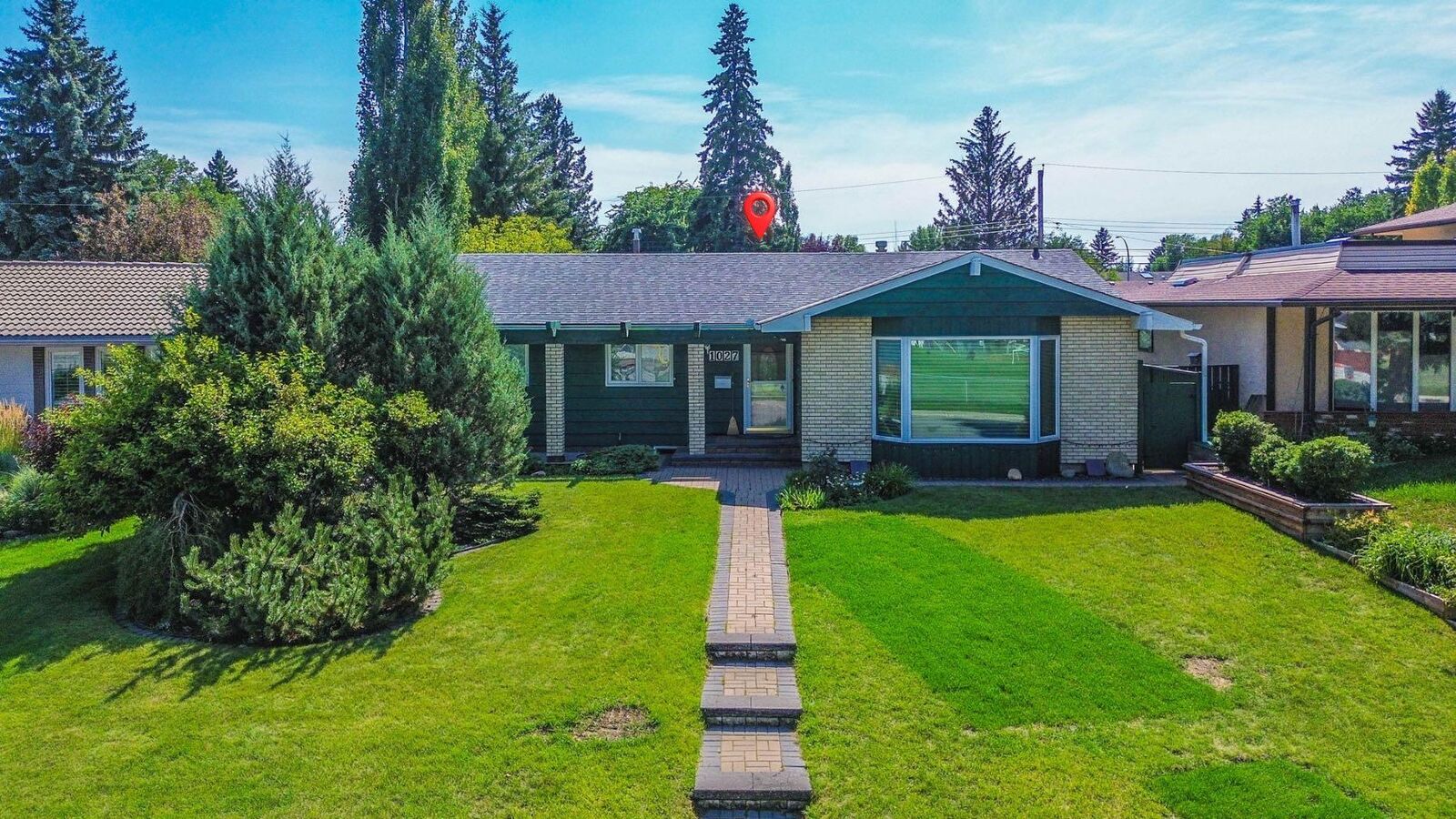 Property Photo:  1027 Lake Sylvan Drive SE  AB T2J 2P9 