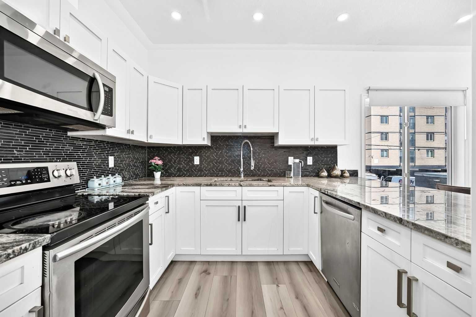 Property Photo:  1514 11 Street SW 1107  AB T2R 1G9 