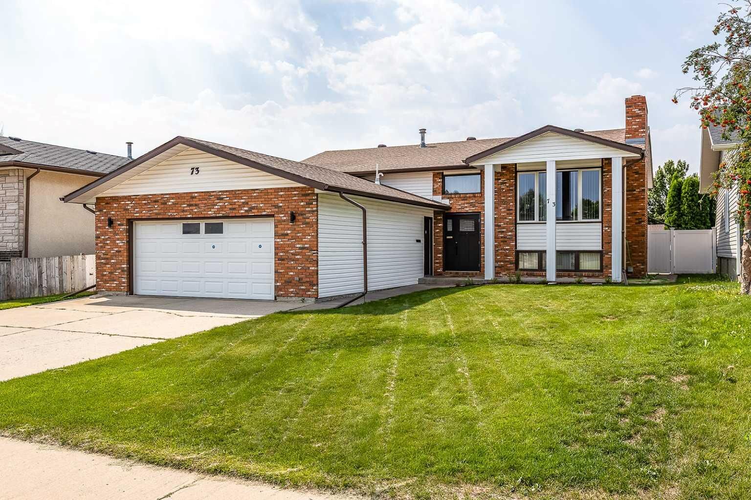 Property Photo:  73 Cooper Road SE  AB T1B 1K3 