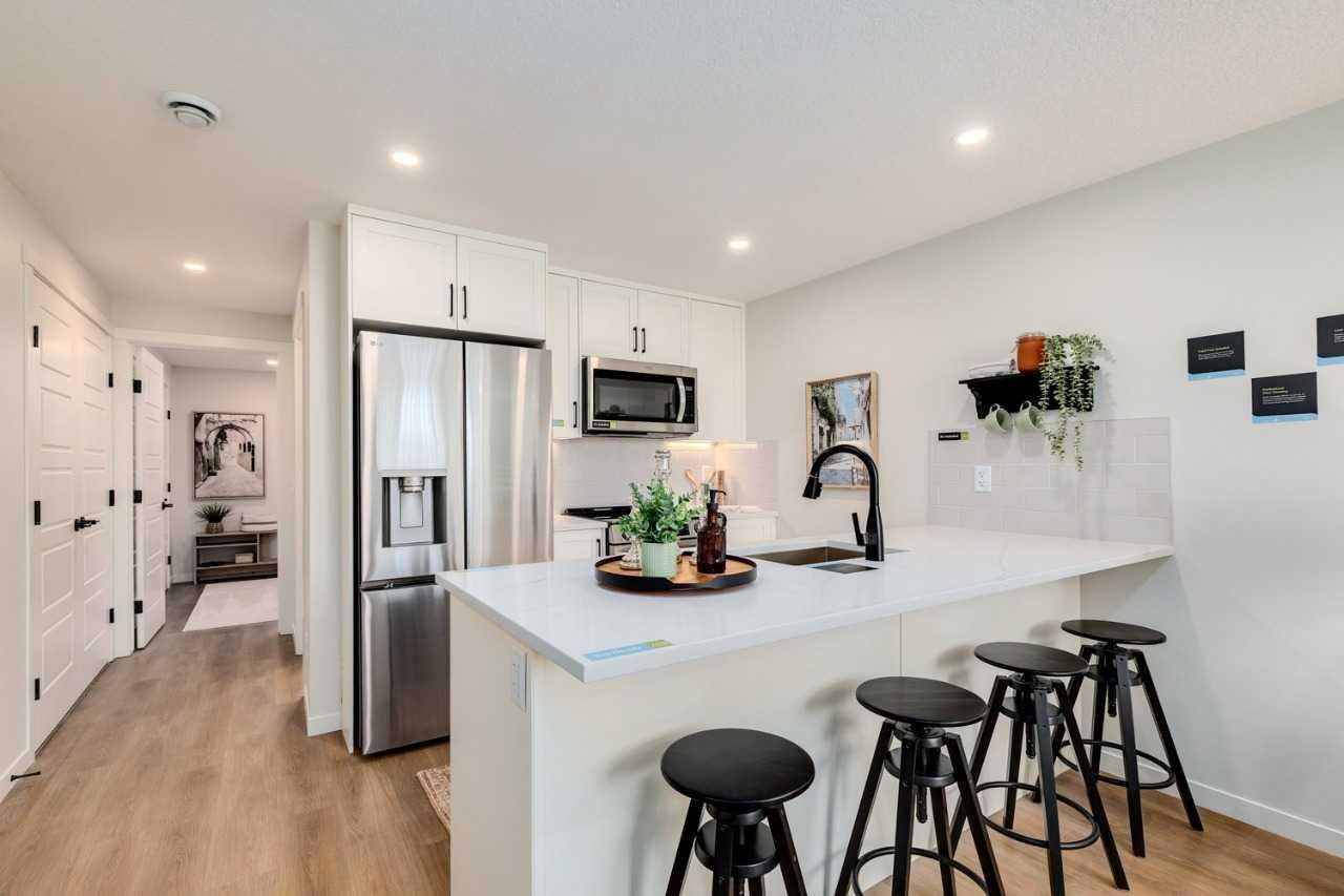 Property Photo: 40 Livingston Parade NE 112 AB T4B 3P6