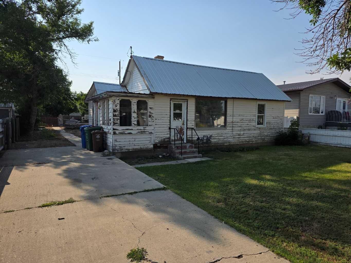 Property Photo:  5906 54 Street  AB T1G 1K3 